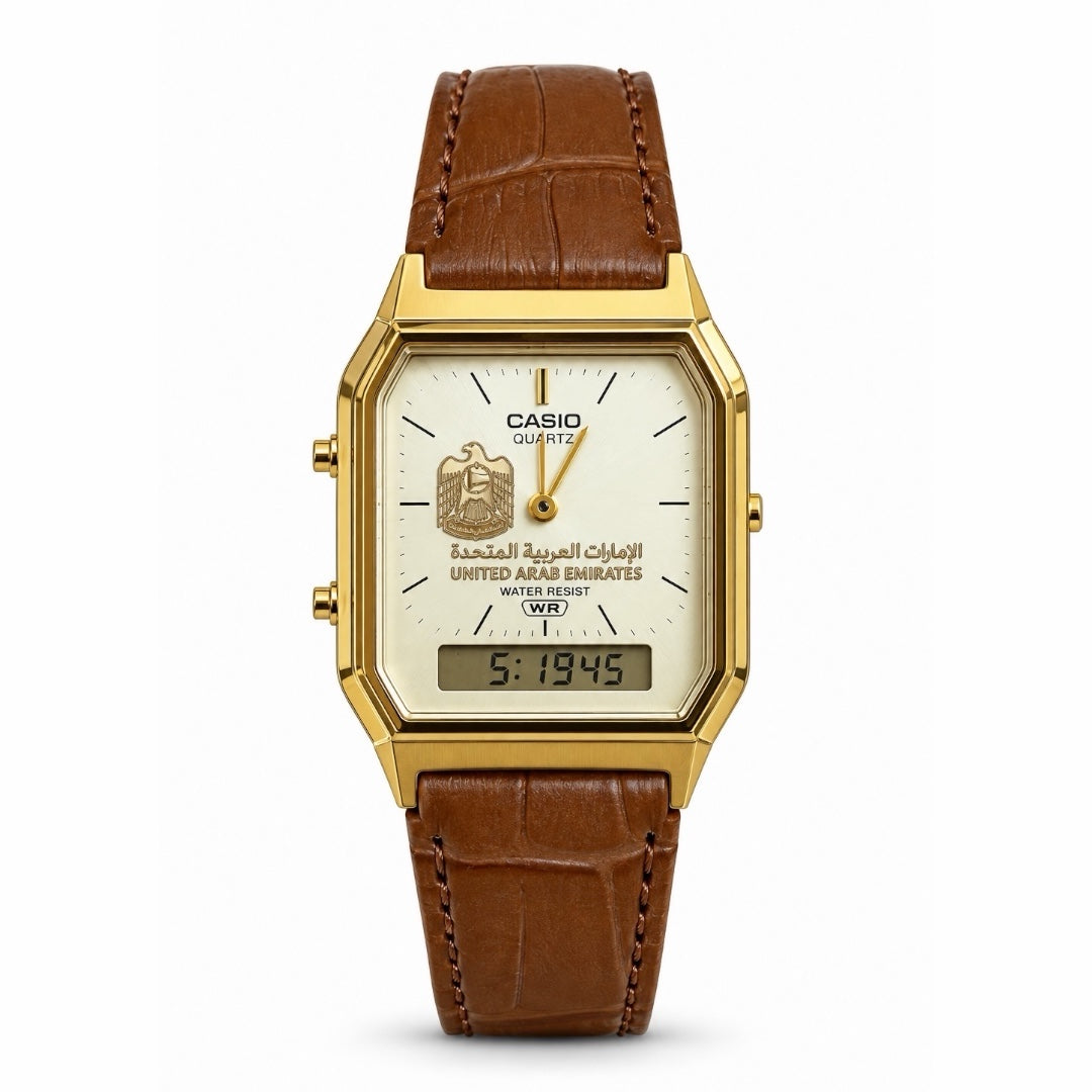 كاسيو كلاسيك ذهبي – مينا أبيض × سوار جلد بني | تصميم شعار الإمارات
Casio Classic Gold – White Dial × Brown Leather | UAE Emblem Edition