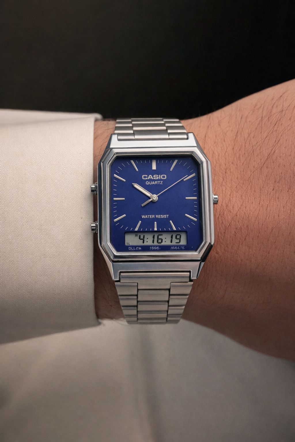ساعة كاسيو كلاسيك بعقارب وشاشة رقمية – فضي بميناء أزرق Casio Classic Square Dual Display Watch – Silver with Blue Dial