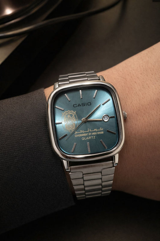 ساعة كاسيو سيلفر – مينا أزرق (تيّل/تركواز) – إصدار حكومة أبوظبي | Casio Silver – Teal Dial – Abu Dhabi Government Edition
